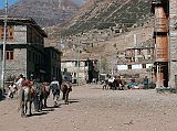 Annapurna 13 01 Manang Manang (3540m) is the main village of the upper valley and could easily be a town in a spaghetti western. These horses are being led up the wide dusty streets in very windy conditions, Clint ... where are you?